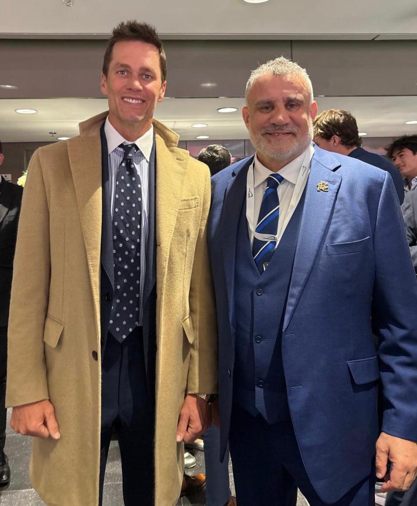Paul Cadman with a guest at an event
