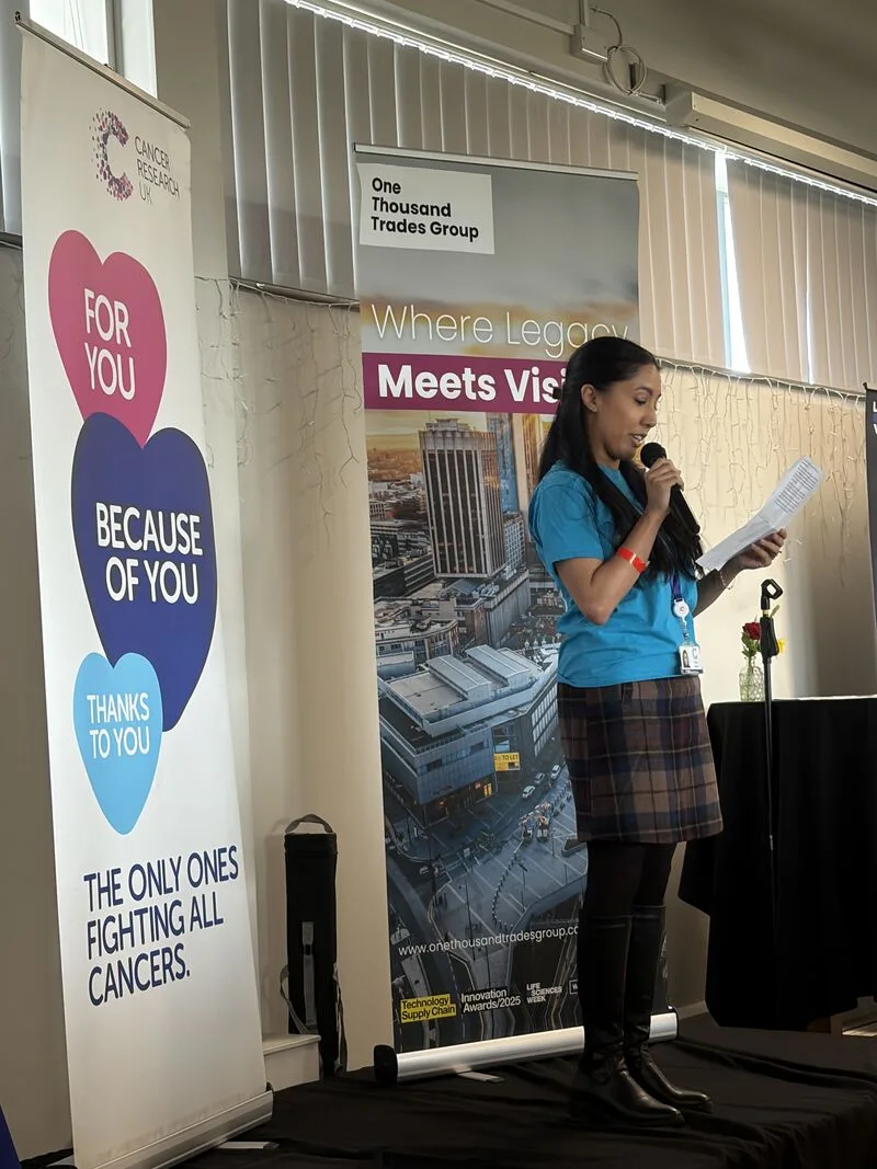 A speaker at the Cancer Research UK event at Birmingham Moseley Rugby Club