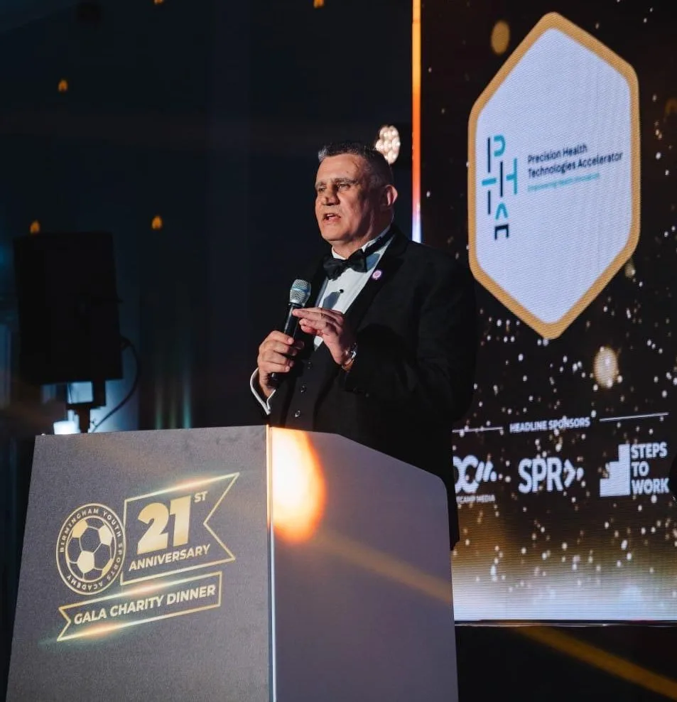 Paul Cadman speaking at a 21st anniversary gala charity dinner